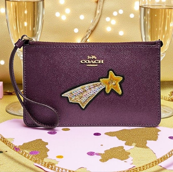 Coach Handbags - Coach Purple Wristlet Clutch with Shooting Star Patch